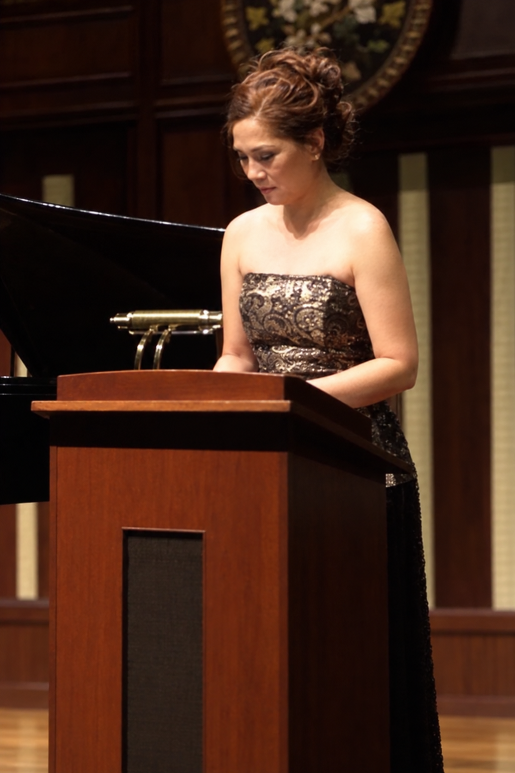 Jean Nabong performing at a recital piano